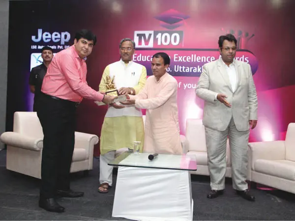 HEC leadership receiving the Best Education Excellence Award 2016