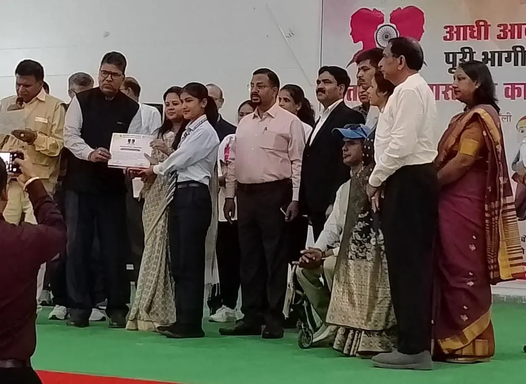 Guests felicitated on stage at a community programme