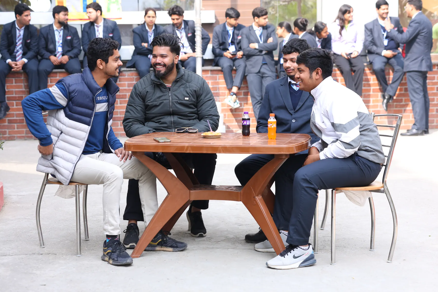 Students relaxing in the cafeteria seating area